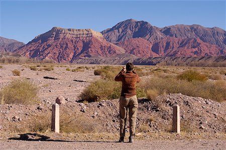 range shooting - Woman Taking Picture, Jujuy Province, Argentina Foto de stock - Con derechos protegidos, Código: 700-00424967