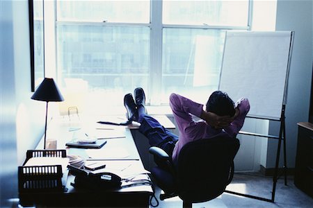 sitting back feet up desk - Businessman with Feet Up in Office Stock Photo - Rights-Managed, Code: 700-00424990