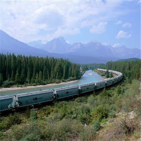 simsearch:700-00168826,k - Train by River and Mountains, Banff National Park, Alberta, Canada Stock Photo - Rights-Managed, Code: 700-00425172