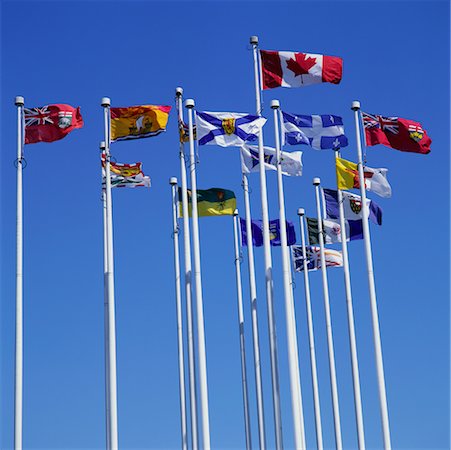 drapeau canadien - Drapeaux provinciaux et un drapeau canadien Photographie de stock - Rights-Managed, Code: 700-00425540