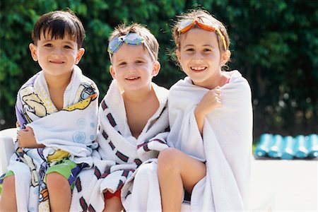 Children Sitting by Pool Stock Photo - Rights-Managed, Code: 700-00425690