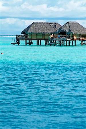Bungalows at Bora Bora Pearl Beach Resort, Bora Bora, French Polynesia Stock Photo - Rights-Managed, Code: 700-00426282