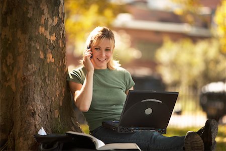 students campus phones - Woman with Laptop and Cell Phone Outdoors Stock Photo - Rights-Managed, Code: 700-00429524