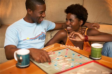 spelling romantic pic - Couple Playing Board Game Stock Photo - Rights-Managed, Code: 700-00429531