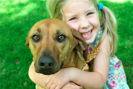 simsearch:700-00814363,k - Girl Hugging Her Dog Foto de stock - Con derechos protegidos, Código: 700-00438947