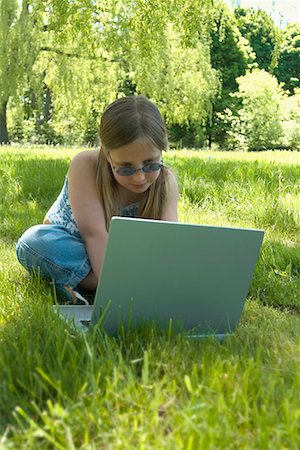 simsearch:700-00183100,k - Girl Using Laptop in Park Stock Photo - Rights-Managed, Code: 700-00438949