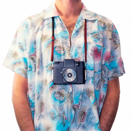 person in hawaiian shirt - Homme avec la caméra autour de cou Photographie de stock - Rights-Managed, Code: 700-00439125