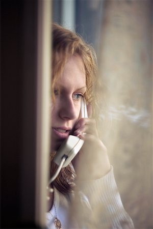 Woman on Phone Foto de stock - Con derechos protegidos, Código: 700-00439394