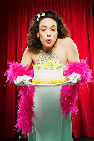 simsearch:600-00060932,k - Woman Blowing Out Birthday Candles Stock Photo - Rights-Managed, Code: 700-00439507