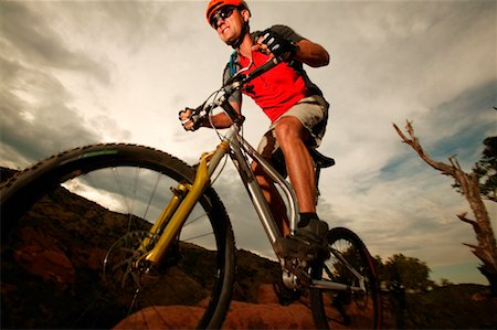 Man Mountain Biking, Red Rocks, Colorado, USA Stock Photo - Rights-Managed, Code: 700-00439520