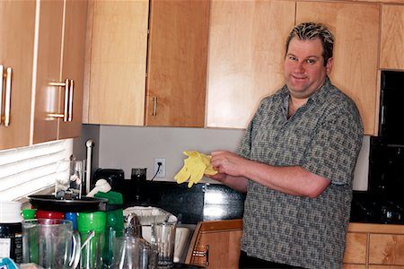 Man Getting Ready to Wash Dishes Stock Photo - Rights-Managed, Code: 700-00439578