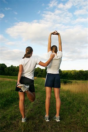 Two Girls Stretching Stock Photo - Rights-Managed, Code: 700-00430068