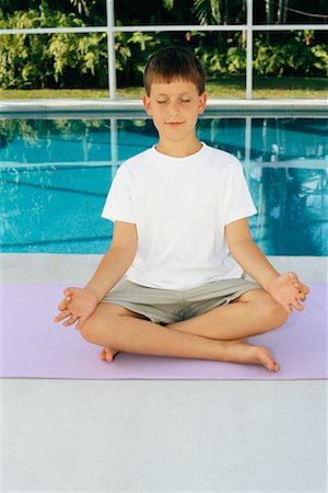 Boy Practicing Yoga Stock Photo - Rights-Managed, Code: 700-00430450