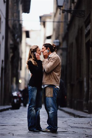 simsearch:700-00263120,k - Couple Using Cellular Phones Face to Face Foto de stock - Direito Controlado, Número: 700-00458284