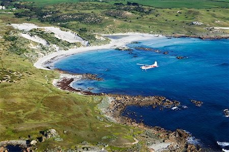 Plane over Shoreline, King Island, Tasmania, Australia Stock Photo - Rights-Managed, Code: 700-00459753