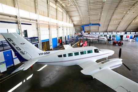 Planes in Airport Hangar Fotografie stock - Rights-Managed, Codice: 700-00452601