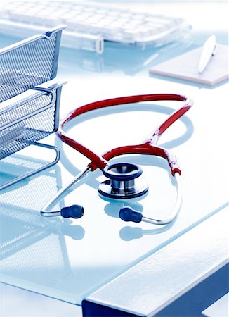 desk doctors office nobody - Stethoscope on Desk Stock Photo - Rights-Managed, Code: 700-00452731
