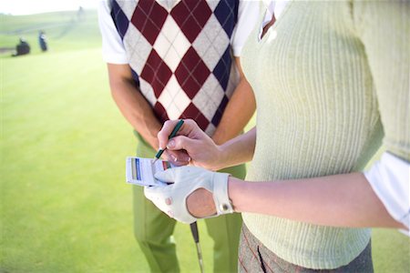 Golfers with Score Card Foto de stock - Direito Controlado, Número: 700-00453047