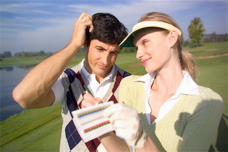 Golfers with Score Card Foto de stock - Direito Controlado, Número: 700-00453055