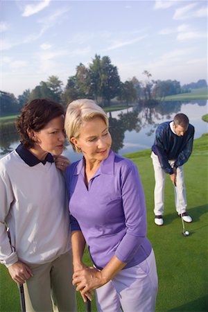 simsearch:700-00453090,k - Women and Man Golfing Fotografie stock - Rights-Managed, Codice: 700-00453092