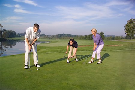 simsearch:700-00453090,k - Women and Man Golfing Fotografie stock - Rights-Managed, Codice: 700-00453093
