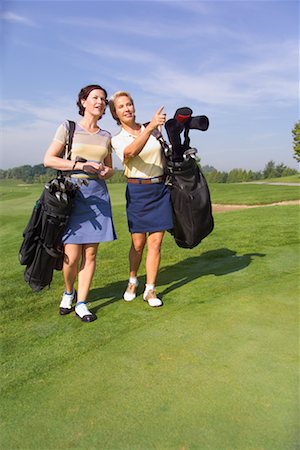 simsearch:700-00453090,k - Two Women Golfing Fotografie stock - Rights-Managed, Codice: 700-00453109