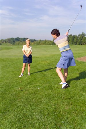 simsearch:700-00453090,k - Two Women Playing Golf Fotografie stock - Rights-Managed, Codice: 700-00453117