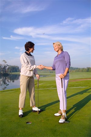 simsearch:700-00453090,k - Women Playing Golf Fotografie stock - Rights-Managed, Codice: 700-00453164
