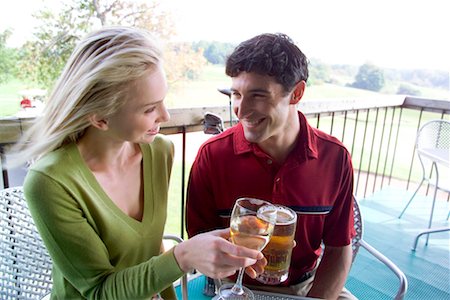 Couple Drinking on Patio Stock Photo - Rights-Managed, Code: 700-00453161