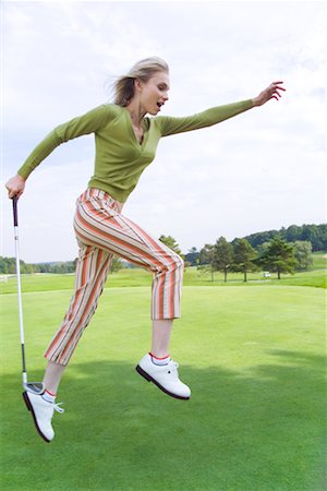 Femme sur le parcours de Golf Photographie de stock - Rights-Managed, Code: 700-00453185