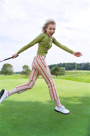 Femme sur le parcours de Golf Photographie de stock - Rights-Managed, Code: 700-00453186