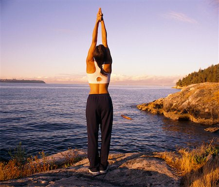 simsearch:700-00185829,k - Woman Stretching Outdoors Stock Photo - Rights-Managed, Code: 700-00453545