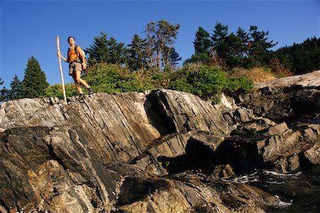 simsearch:600-03641250,k - Woman Hiking on Rocky Ledge Stock Photo - Rights-Managed, Code: 700-00453552