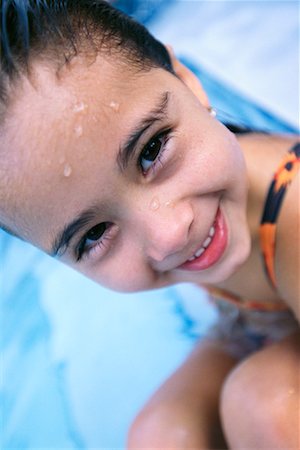 Girl Sitting in Pool Stock Photo - Rights-Managed, Code: 700-00453690