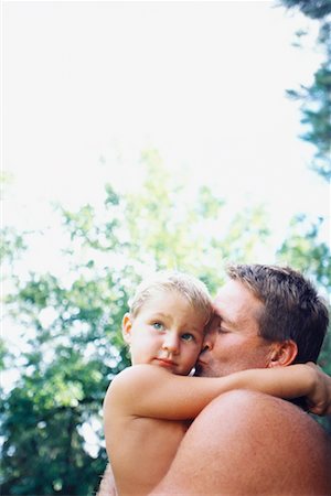 simsearch:700-00094091,k - Father Kissing Son Foto de stock - Con derechos protegidos, Código: 700-00453714