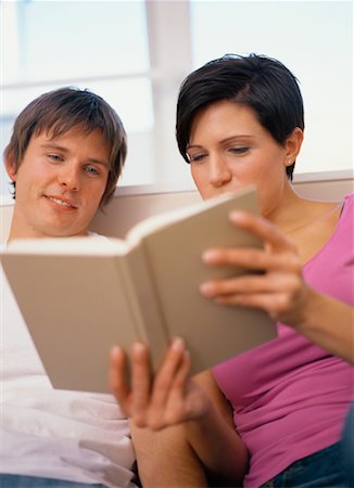 Couple Reading Book Foto de stock - Con derechos protegidos, Código: 700-00460043