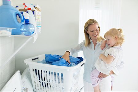 simsearch:700-00035630,k - Mother and Daughter Doing Laundry Stock Photo - Rights-Managed, Code: 700-00476707