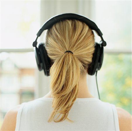 Back of head with headphones Stock Photos Page 1 Masterfile