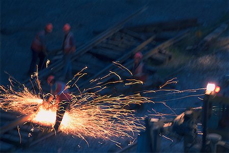 railroad worker - Men Cutting Rail Foto de stock - Con derechos protegidos, Código: 700-00476979