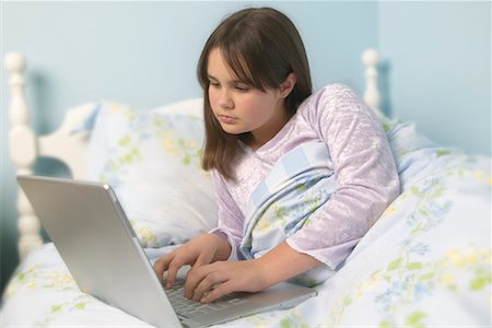 simsearch:700-00183100,k - Girl Using Laptop Stock Photo - Rights-Managed, Code: 700-00477140