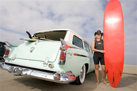 surfers and middle age and car - Portrait of Woman with Surfboard By Car Stock Photo - Rights-Managed, Code: 700-00477299