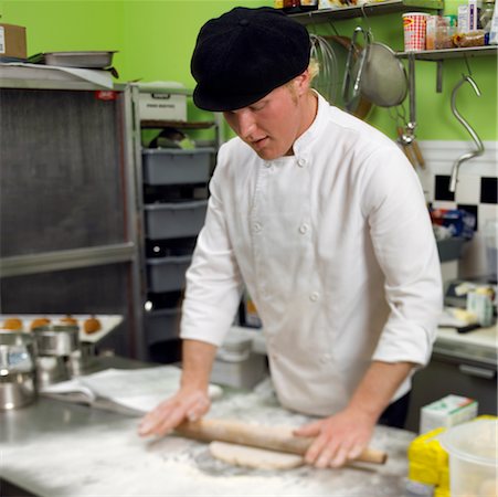 simsearch:649-06165045,k - Baker Rolling Dough Stock Photo - Rights-Managed, Code: 700-00477701