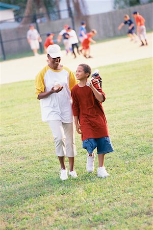 single mom at sons baseball game - Mother and Son at Baseball Game Stock Photo - Rights-Managed, Code: 700-00477807