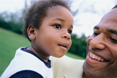 pausbacken - Vater und Sohn Stockbilder - Lizenzpflichtiges, Bildnummer: 700-00477850