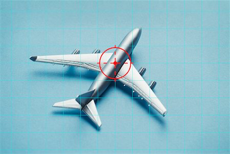 Toy Airplane with Grid and Crosshairs Stock Photo - Rights-Managed, Code: 700-00477907