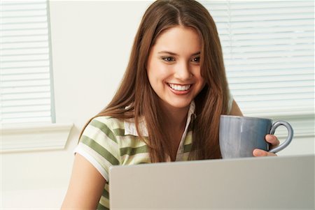 simsearch:700-00183100,k - Girl with Computer Stock Photo - Rights-Managed, Code: 700-00477988