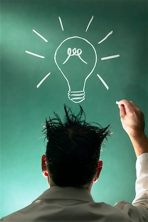 draw light bulb - Man With Idea at Blackboard Foto de stock - Con derechos protegidos, Código: 700-00478035