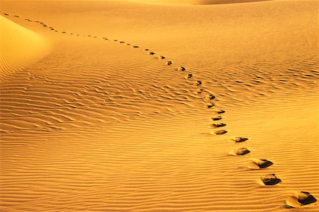 simsearch:700-00082361,k - Footprints in Desert Stock Photo - Rights-Managed, Code: 700-00478260