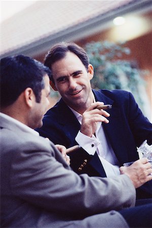 smoking cigars friends - Two Men Smoking Cigars Stock Photo - Rights-Managed, Code: 700-00478637