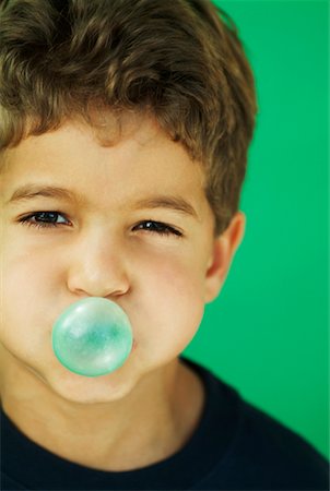 Portrait of Boy Blowing Bubble Stock Photo - Rights-Managed, Code: 700-00478715